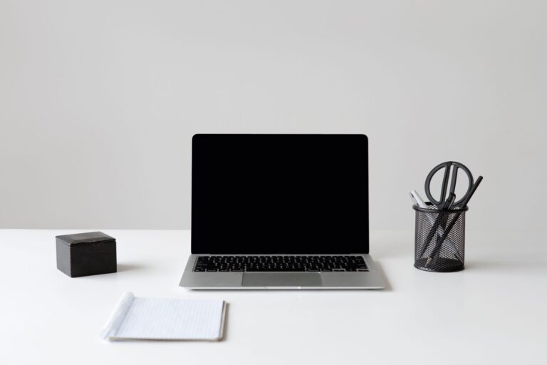 Laptop on a clean white desk